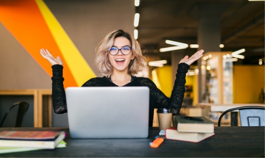 funny-happy-excited-young-pretty-woman-sitting-table-black-shirt-working-laptop-co-working-office-wearing-glasses_285396-86.jpg